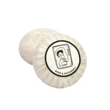 Heaven Scent Bergamot, Rose & Patchouli natural origin shaving soap. The round, plant-based soap is shown wrapped in traditional pleat paper, sealed with a circular label featuring a black and white Sarah Pettitt illustration of a lady.