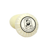 Heaven Scent Citrus, Rosemary & Petitgrain natural origin shaving soap. The round, plant-based soap is shown wrapped in traditional pleat paper, sealed with a circular label featuring a black and white Sarah Pettitt illustration of a man.
