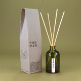 Green Botanical Wild Plum 100ml apothecary glass reed diffuser by Heaven Scent with natural reed sticks and illustrated packaging.