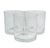 Heaven Scent 12x12cm clear glass candle jar filled with colourful dinner candles, sold in packs of three and made in the UK
