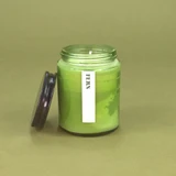 Green Botanical 150ml pharmacy jar Fern scented candle by Heaven Scent in a glass jar with a black lid.