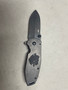 CRKT SCRATCH & DENT Squid Assisted Black Knife, Engraving error image