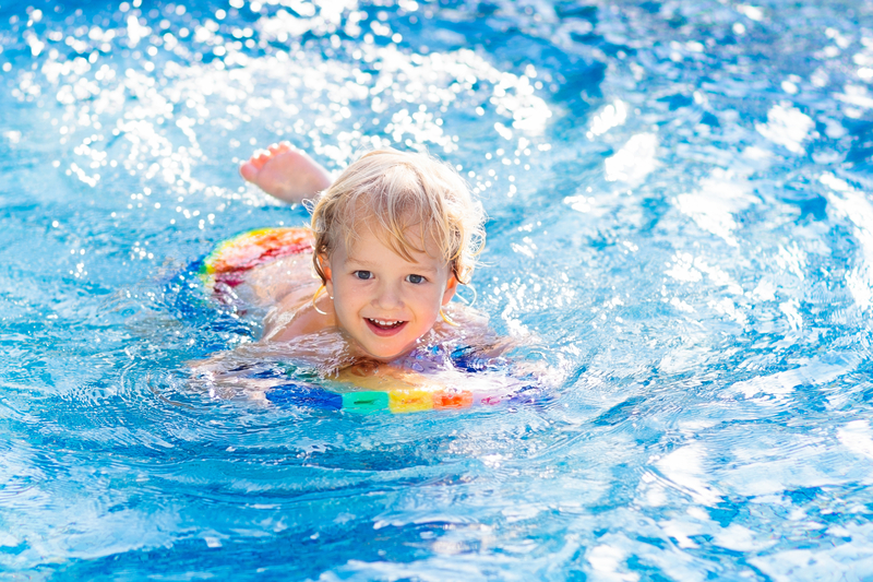 Top Swimming Skills to Teach Toddlers Piggyback Rider