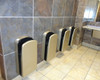 Veltia hand dryers mounted on the wall