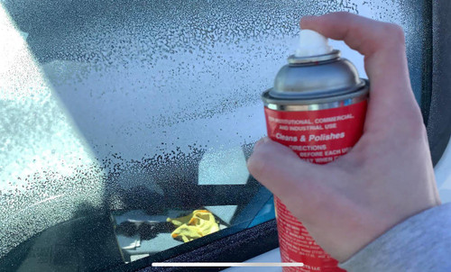 Show Car Glass Cleaner foams as you spray it.