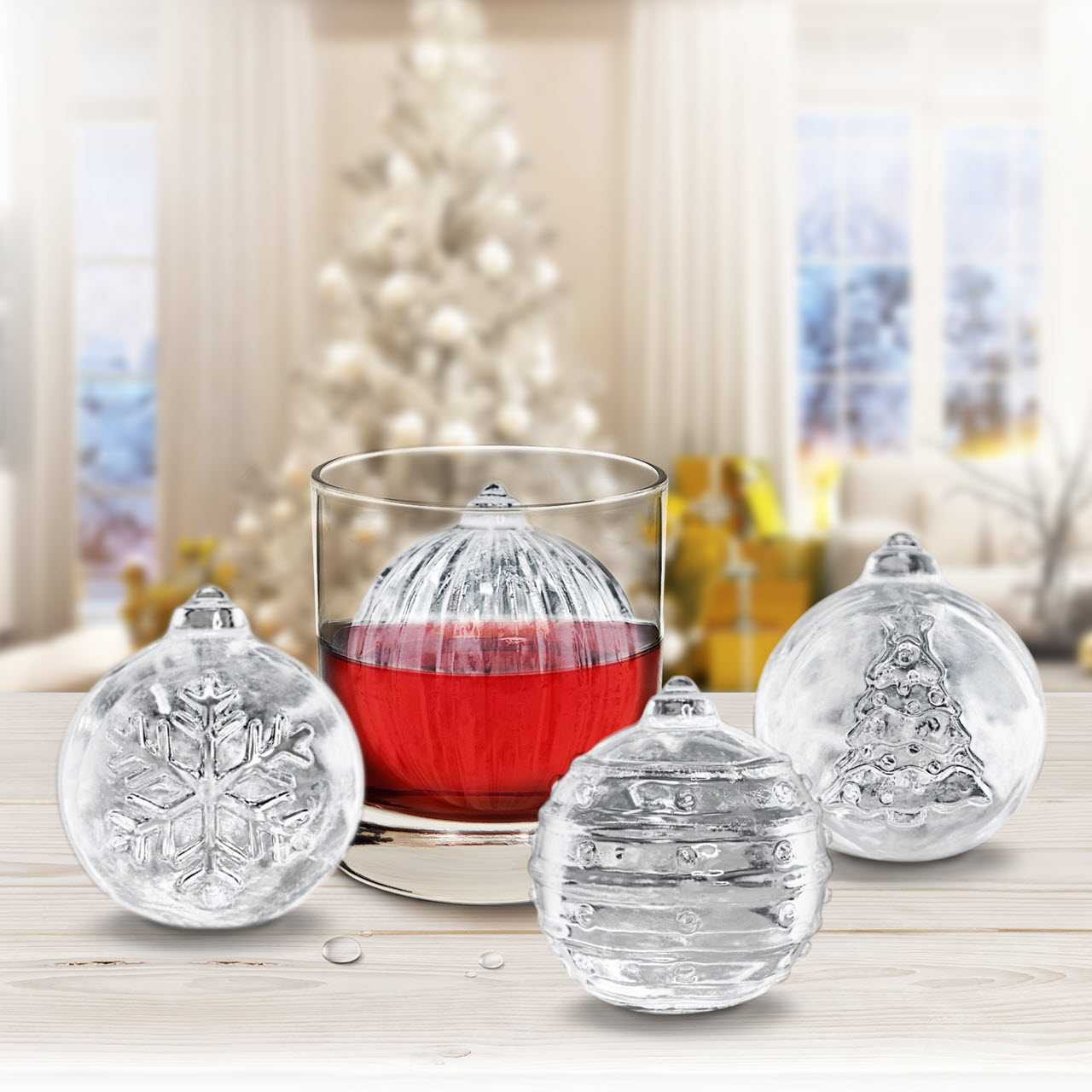 https://cdn11.bigcommerce.com/s-21kj3ntgv1/images/stencil/1280x1280/products/646/2875/Tovolo-Christmas-Ornament-Ice-Molds-Set-lifestyle__31140.1676327080.jpg?c=2