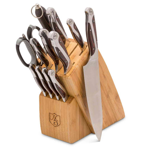 The Hammer Stahl 12 Piece Cutlery Essentials Set with all of the knives and accessories in the bamboo knife block.