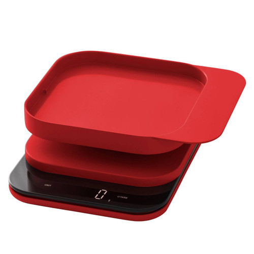 The red Rosti Mensura Kitchen scale with weighing bowl and a white background