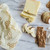 Bee's Wrap cheese wrap wrapping cheese on a marble counter