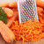 The handy grater grating carrots