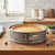 A Mrs Andersons Baking Nonstick Springform Pan filled with a baked cheesecake on a kitchen counter