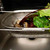 Rinsing beets in the RSVP Endurance Precision Pierced Stainless Steel In Sink Drainer in the sink