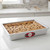 A chocolate chip blondie baked in the Fat Daddio's 8x12x2 Sheet Cake Pan