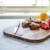 The Madeira Teak Edge Grain Cutting Board in use