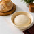 An Eddingtons 10 inch round banneton basket with proofing dough
