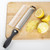 PL8 Zester & Grater on cutting board with lemons