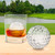 Tovolo Golf Ball Ice Molds Set of 3 in use in a glass and a close up shot of the golf ball ice