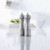 The Trudeau 8 Inch Professional Stainless Steel Salt Mill and Pepper Mill Set on a kitchen counter