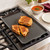 The Nordic Ware Two-Burner Griddle King with grilled cheese.