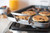 Close up view of Nordic Ware Two Burner High-Sided Griddle's handle