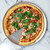 A margherita pizza on the Nordic Ware Aluminum Hot Air Pizza Crisper