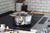 Heritage Steel Titanium Series 4 Quart Saucepan With Lid on a stovetop in a kitchen