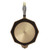 Overhead view of the flat bottom of the inside of the FINEX 10-Inch Cast Iron Skillet on a white background.