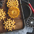 An overhead shot of rosettes made with the Nordic Ware Swedish Rosettes & Timbales Set on a wood tray