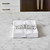 The white Now Designs flour sack dish towels on a kitchen counter