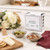 A couple of the dippling bowls in the Danica Heirloom Unite Element Dipping Bowl Set are filled with olives and nuts.