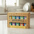 The 10 tins of the Spicewalla Signature Gift Set in the gift set packaging on a kitchen counter