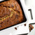 A close up of a Fat Daddio's Bread Pan filled with a loaf of banana bread.