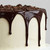 A white birthday cake with smooth iced sides. Another example of what you can do with a straight edge spatula