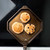 Three pancakes cooking on the FINEX 10 inch cast iron griddle pan