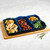 The Trudeau Silicone Sheet Pan Dividers filled with food