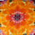 A close-up view of one of the purples and oranges tie dye kitchen towels