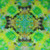 A close-up view of one of the greens and yellows tie dye kitchen towels