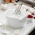 The Rosti Margrethe Mixing Bowl splash guard lid in use whipping egg whites