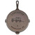 An overhead view of the bottom of the Lancaster No. 8 cast iron skillet