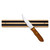 A knife on the Harold Import 12 Inch Magnetic Knife Holder.