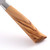 A closeup view of the Messermeister Oliva Elite Nakiri Knife handle