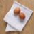 The Now Designs Ripple White Dish Cloths with eggs