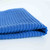 A folded Now Designs Ripple Royal Blue Dish Cloth