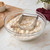 A Mrs. Anderson's Baking Pastry Blender in a bowl with butter, flour, and brown sugar for a streusel topping.