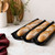The Birkmann Bread Buddies Three Baguette Tray with baked baguettes