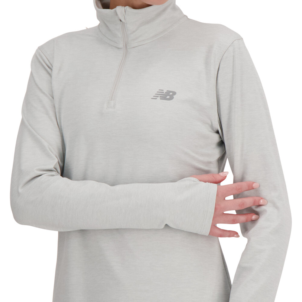 New Balance Sport Essentials Space Dye Quarter cremallera mujer Top - SS26