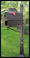 Choose your options to create your unique mailbox, this mailbox includes the following-
Acorn finial, 3" Fluted round pole, MB1 mailbox w/ address plate, newspaper box, Decorative Scroll and a Europa base