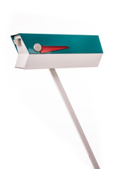 This mid-century modern mailbox design was inspired by those produced in the 1950s and 1960s. Two-tone color brings out the design’s clean lines. Colors are original Eichler Exterior Accent Colors. Now you can have a mailbox that looks great with your mid-century, modern, and/or contemporary home.  The perfect blast from the past for your Atomic Ranch!  Crafted in America, the way it used to be.

Material: 20 gauge galvannealed steel, same as the 50s-70s [75%+ thicker than most mailboxes made today]
Paint: powder coated inside and out, baked at 400 degrees [environmentally friendly]
Anodized aluminum flag cap and door pull
Size: 7” wide x 7.75” high x 21.25” long