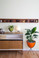 Mini Bullet Planter in Olive, and Medium Retro Bullet Planter in Hot Orange