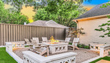 How to Design a Cozy Backyard Gathering Space Around Your Fire Pit